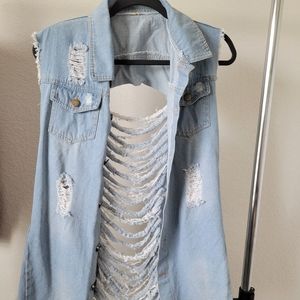 Knee length distressed jacket